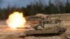 A U.S. Army M1A1 Abrams tank fires during NATO military exercises in Latvia in 2021.