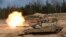 A U.S. Army M1A1 Abrams tank fires during NATO military exercises in Latvia in 2021.