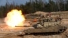 A U.S. M1A1 Abrams tank fires during NATO military exercises in Latvia in 2021. Washington said 31 of the battle tanks would be sent to Ukraine.