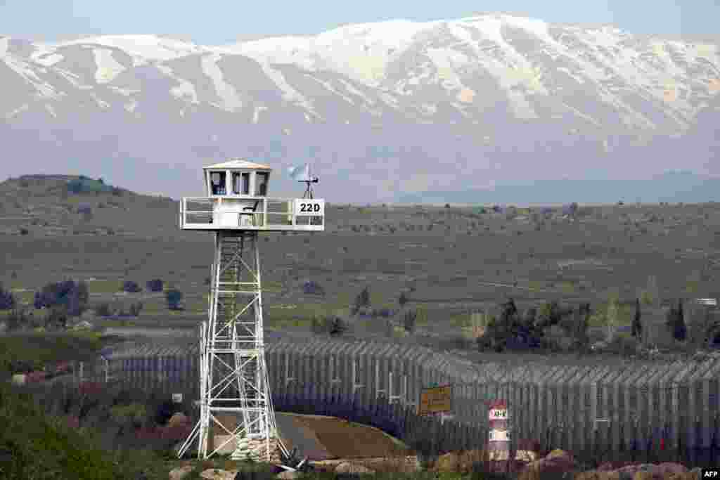 Ərəb informasiya agentlikləri İsrailin hava zərbələri ilə Suriya ərazisində dağılan obyektləri n&uuml;mayiş etdirir. 5 may 2013