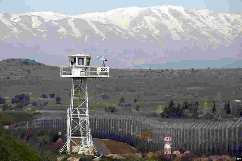 Ərəb informasiya agentlikləri İsrailin hava zərbələri ilə Suriya ərazisində dağılan obyektləri nümayiş etdirir. 5 may 2013