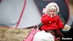 Украинско дете в бежански лагер в Полша