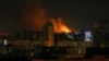 Зарево от пожара после обстрела российскими войсками Киева, 26 февраля 2022 года