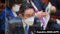 Japan's Prime Minister Fumio Kishida answers questions about the crisis between Russia and Ukraine, during an upper house budget committee session at parliament in Tokyo on February 28, 2022.