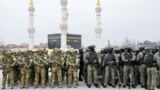 Украинага аттанган жоокерлер. Грозный шаары. 25-февраль, 2022-жыл. Иллюстрациялык сүрөт.