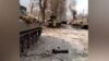 Ukrainian Man Films Devastation In His Town After Russian Military Column Destroyed screen grab