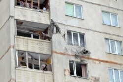 Bloc de locuințe bombardat la Harkov, 26 februarie 2022.