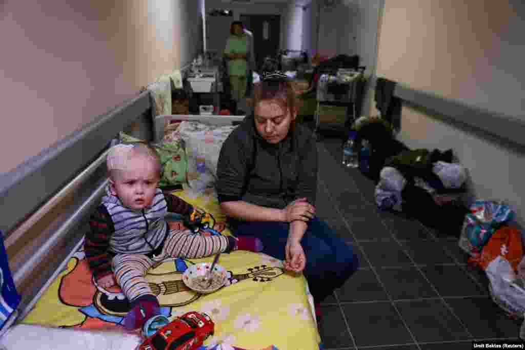 Nurses, family, and patients seek shelter in the basement of Okhmadet Children&#39;s Hospital in Kyiv.