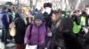 Anti-war protesters are detained in Yekaterinburg on February 26. The Kremlin said it needed a "harsh" new law to tackle such reports due to the current "information war."