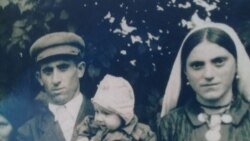 Билор Тутадзе с мужем и ребенком.
