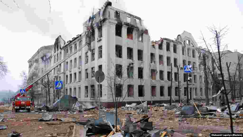 UKRAINE - Firefighters work to extinguish a fire at the Kharkiv National University building, which city officials said was damaged by recent shelling, in Kharkiv, Ukraine March 2, 2022