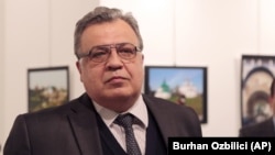 The slain Russian ambassador to Turkey, Andrei Karlov, speaks at the gallery in Ankara shortly before the shooting on December 19, 2016.