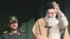 Is Supreme Leader Ayatollah Ali Khamenei (right) simply a pawn of the Revolutionary Guard, and its commander, General Mohammad Ali Jafari?