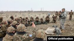 Armenia - U.S. military instructors train Armenian non-commissioned officers, 28Feb2014.