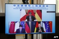 Olaf Scholz spune că a discutat cu Emanuel Macron despre vizita pe care o efectuează săptămâna aceasta la Beijing.