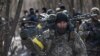 Українські військові штурмують населений пункт на Київщині, де перебувають російські сили. 10 березня 2022 року