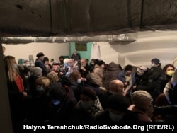 Cancer patients in Lviv crowd into an underground shelter at the hospital during an air-raid warning.
