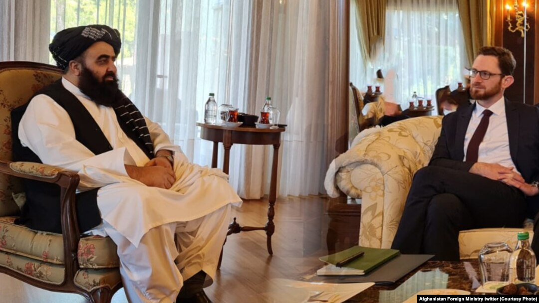 Taliban envoy Amir Khan Muttaqi (left) meets with U.S. envoy Thomas West in March in Antalya, Turkey.