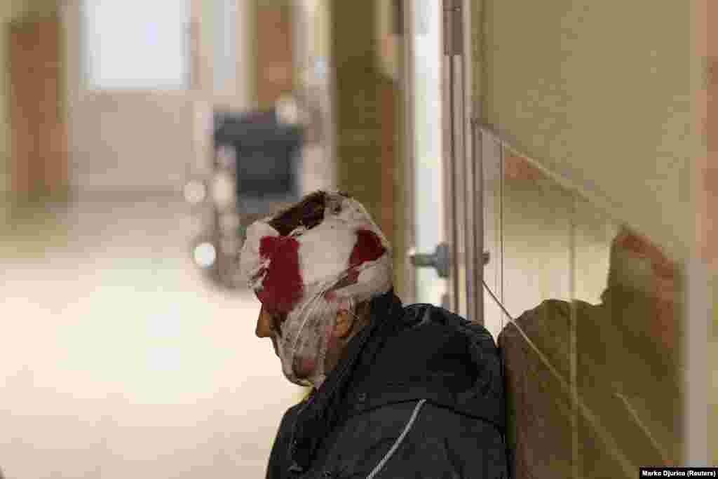 An injured man in a hospital waiting room in Kramatorsk on April 19.&nbsp;