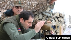 Armenia - Defense Minister Suren Papikian visits an Armenian army post in Syunik, March 17, 2022.