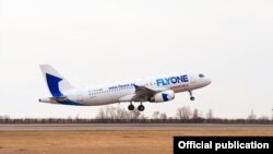 Armenia - A FlyOne Armenia plane takes off from Yerevan's Zvartnots airport, March 17, 2022.