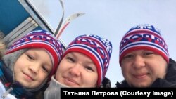 Татьяна Петрова с мужем и ребенком