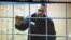 Russian opposition leader Aleksei Navalny speaks from prison via a video link in Petushki, Russia, in January.
