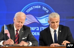 Președintele american Joe Biden și premierul interimar al Israelului, Yair Lapid. 14 iulie 2022.