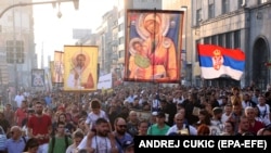 Protestors march in Belgrade on August 28 against the international LGBT event EuroPride scheduled to be held in the Serbian capital later this month.