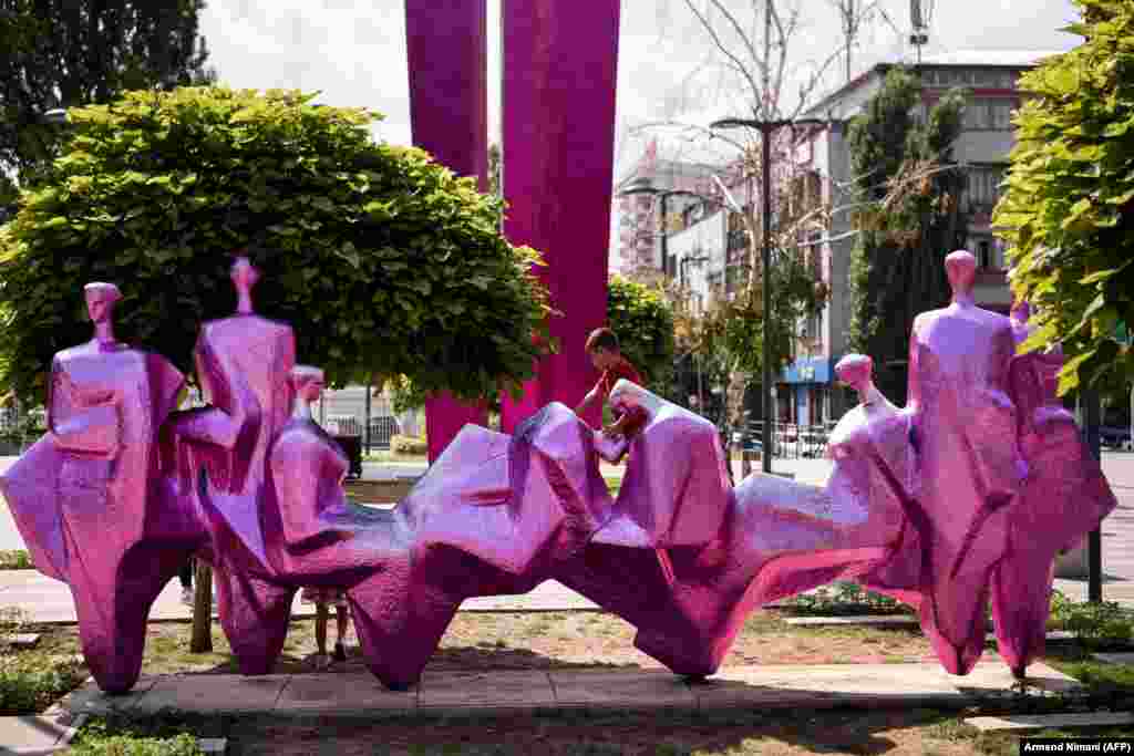 This Yugoslav-era monument was once a testament to the different ethnic groups in Kosovo. Today it stands wrapped in rose-colored foil applied by Swiss artist Ugo Rondinone as part of the Manifesta 14 biennial in Pristina.