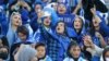 Female fans of Iran's Esteghlal football club cheer during a match between Esteghlal and Mes-e Kerman at Azadi Stadium in Tehran on August 25. It was the first time Iranian women were allowed to attend a national football championship match since the 1979 Islamic Revolution.