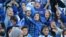 Female fans of Iran's Esteghlal football club cheer during a match between Esteghlal and Mes-e Kerman at Azadi Stadium in Tehran on August 25. It was the first time Iranian women were allowed to attend a national football championship match since the 1979 Islamic Revolution.