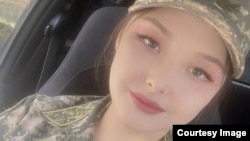 Aighanym Elshibaeva insists she was forced out of the army after she rejected the sexual advances of her commander and reported the incident to authorities.