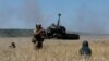 Ukrainian soldiers drive a self-propelled AHS Krab howitzer after engaging Russian forces in the Donetsk region on August 23.<br />
<br />
The Polish government donated 18 Krabs to assist the Ukrainian military in its defense against the Russian invasion.