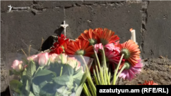 Floral tributes near the scene of the August 14 explosion at the Surmalu market in Yerevan.
