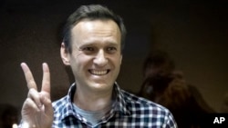  Навални в съда в Москва през февруари 2021 година, откакто оцеля при опита на съветските спецслужби да го отровят 
