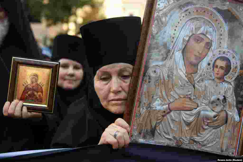 Serbian Orthodox Bishop Nikanor hailed the authorities&#39; decision to reverse &quot;the desecration of our country, our church, and our family.&quot;&nbsp;Nearly 85 percent of Serbians identify as Orthodox Christians.