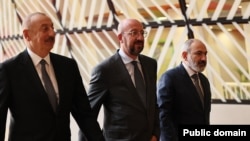 EU Council President Charles Michel (center) meets with Azerbaijani President Ilham Aliyev (left) and Armenian Prime Minister Nikol Pashinian in Brussels on August 31. 