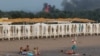 Smoke rises from Saky air base following the attack on August 9.