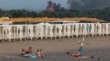 Smoke and flames rise after explosions at a Russian military airbase in Novofedorivka, Crimea, in August.