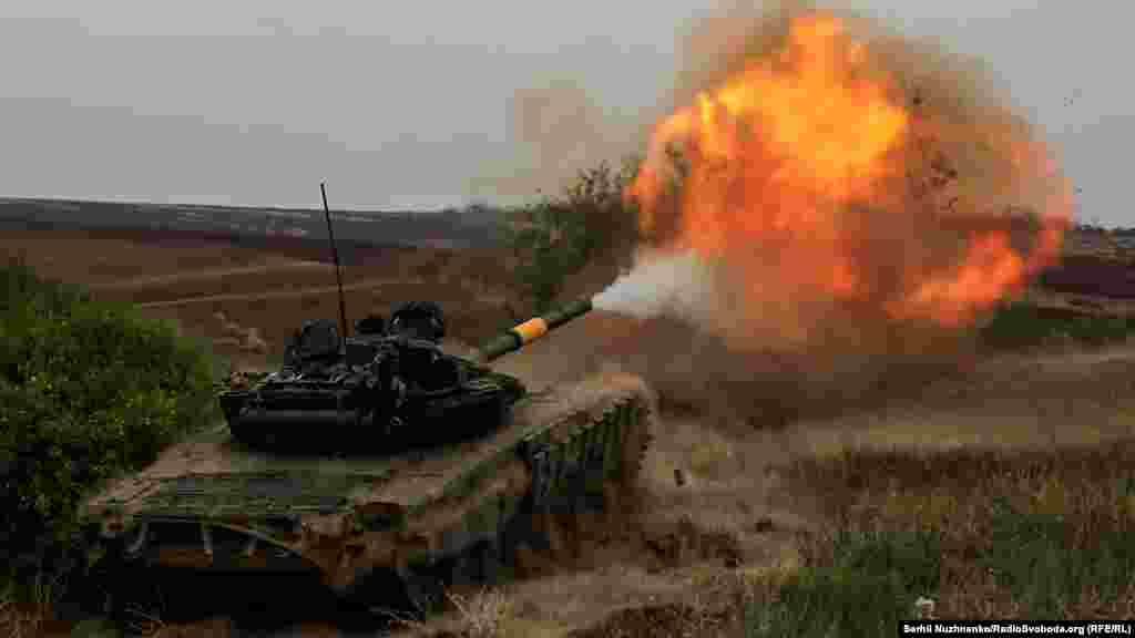 A tank fires at Russian forces in the Donetsk region. Ukraine uses various models of tanks to engage the Russians in combat, including tanks that were captured from the Russian side.