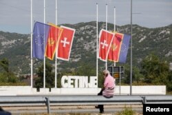 Flags were lowered to half-staff at the entrance to Cetinje during three days of national mourning for the victims.