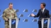 NATO Secretary General Rutte (right) holds a joint news conference with General Alexus Grynkewich, NATO's supreme allied commander Europe.