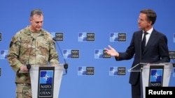 NATO chief Mark Rutte (right) holds a joint news conference with US General Alexus Grynkewich, NATO's supreme allied commander Europe.