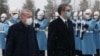 Turkish President Tayyip Recep Erdogan (left) and Serbian President Aleksandar Vucic review a guard of honor during a welcome ceremony for the latter's visit to Ankara on January 18. 