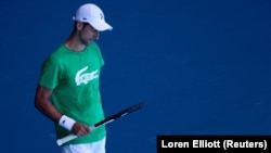 Serbian tennis player Novak Djokovic practices at Melbourne Park on January 13 before his visa was again canceled by the Australian government.