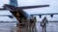 Airmen from the 4th Fighter Wing at Seymour Johnson Air Force Base, US, and the 48th Fighter Wing, Royal Air Force Lakenheath, England, arrive at Amari Air Base, Estonia, January 24, 2022. 