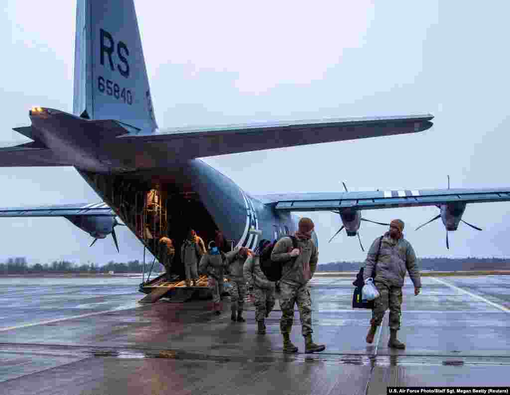 U.S. and British airmen arrive at Estonia&#39;s Amari Air Base on January 24. The servicemen traveled from Germany to support a NATO &quot;air policing&quot; mission. The photo was released on January 26.&nbsp;