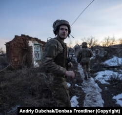 A young Ukrainian soldier near the front lines at an undisclosed location in the Donetsk region of eastern Ukraine in early January.