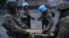 'Gross Misuse': UN Helmets Worn By Kazakh Troops During Crackdown